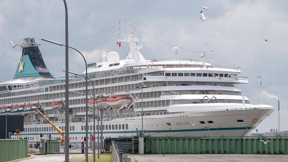 08 June 2020, Bremen, Bremerhaven: The cruise ship Artania docks at the harbour.